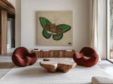 Vintage Green Butterfly by Deborah Revell. Shown as extra-large giant wall art in a modern living room. Available as an archival giclee rolled canvas, fine art paper, or poster print. SKU 91131a.