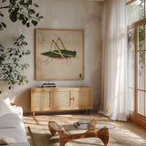 Vintage Green Grasshopper by Deborah Revell. Shown in a natural wood frame in a cozy modern living room. Available as an archival giclee rolled canvas, fine art paper, or poster print. SKU 91136a.