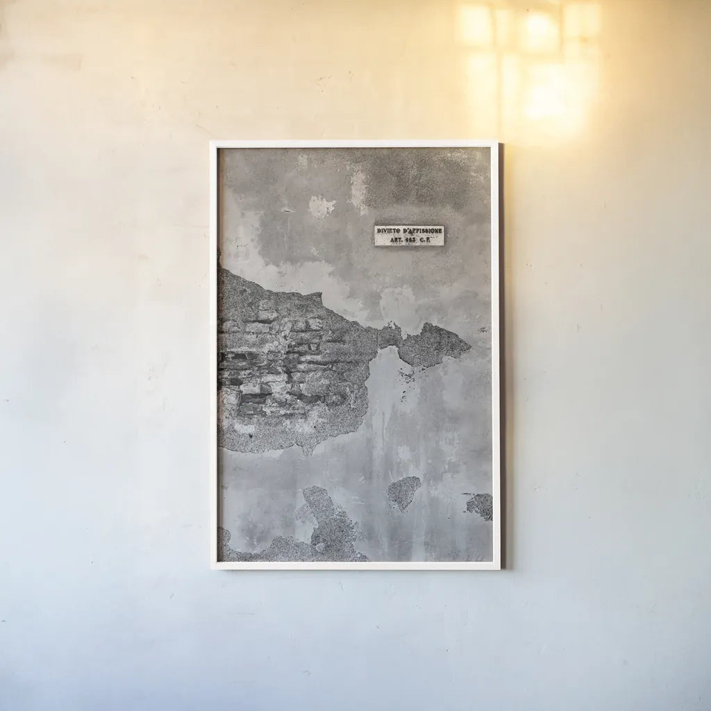 Volterra Wall by Deborah Revell. shown as a paper print in a white frame. Available as a archival giclee rolled canvas, fine art paper, or poster print. SKU 93400h.