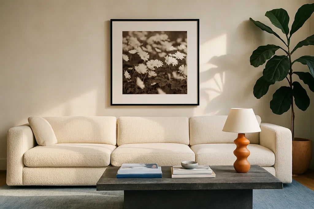 Wild Daisies by Deborah Revell. Displayed in a glass frame with matte in a clean modern living room. Available as an archival giclee rolled canvas, fine art paper, or poster print. SKU 96826a.