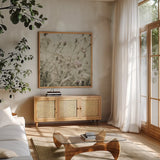 Wild Flowers III No Texture by Deborah Revell. Shown in a natural wood frame in a cozy modern living room. Available as an archival giclee rolled canvas, fine art paper, or poster print. SKU 91918a.