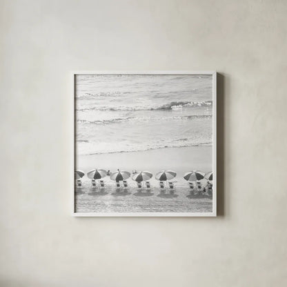 A Day At The Beach BW Crop by Debra Van Swearingen. Shown in a crisp white glass frame for a clean and minimalist style. Available as an archival giclee rolled canvas, fine art paper, or poster print. SKU 77150a.