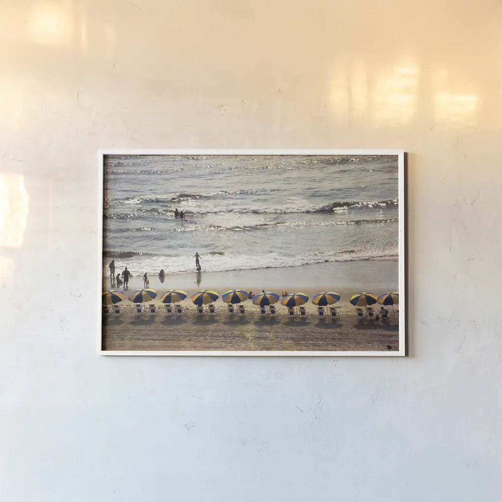 A Day at the Beach by Debra Van Swearingen. shown as a paper print in a white frame. Available as a archival giclee rolled canvas, fine art paper, or poster print. SKU 47846i.