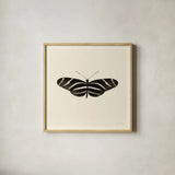 Butterfly IX BW by Debra Van Swearingen. Shown in a natural wood glass frame for a timeless modern aesthetic. Available as an archival giclee rolled canvas, fine art paper, or poster print. SKU 27640a.