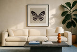 Butterfly V Gray by Debra Van Swearingen. Displayed in a glass frame with matte in a clean modern living room. Available as an archival giclee rolled canvas, fine art paper, or poster print. SKU 92347a.