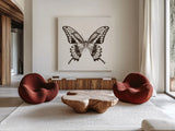 Butterfly VI BW on White by Debra Van Swearingen. Shown as extra-large giant wall art in a modern living room. Available as an archival giclee rolled canvas, fine art paper, or poster print. SKU 92207a.