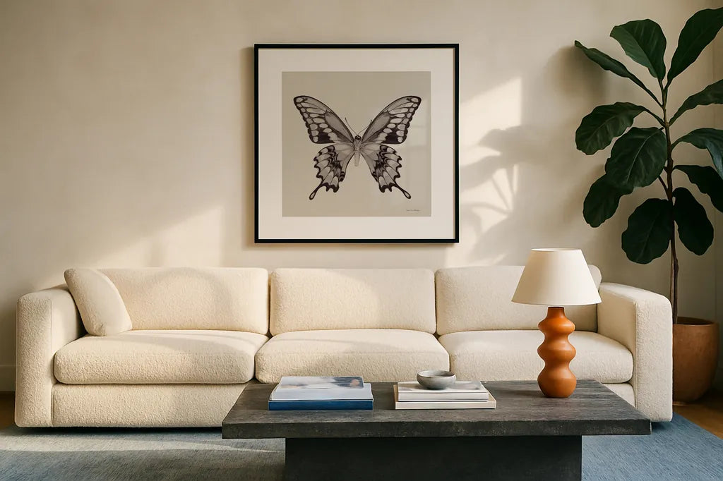 Butterfly VI Gray by Debra Van Swearingen. Displayed in a glass frame with matte in a clean modern living room. Available as an archival giclee rolled canvas, fine art paper, or poster print. SKU 92346a.