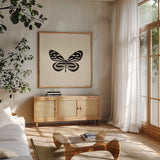 Butterfly VIII BW by Debra Van Swearingen. Shown in a natural wood frame in a cozy modern living room. Available as an archival giclee rolled canvas, fine art paper, or poster print. SKU 25729a.