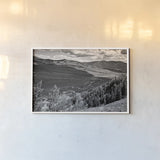 Colorado Valley BW by Debra Van Swearingen. shown as a paper print in a white frame. Available as a archival giclee rolled canvas, fine art paper, or poster print. SKU 82776i.