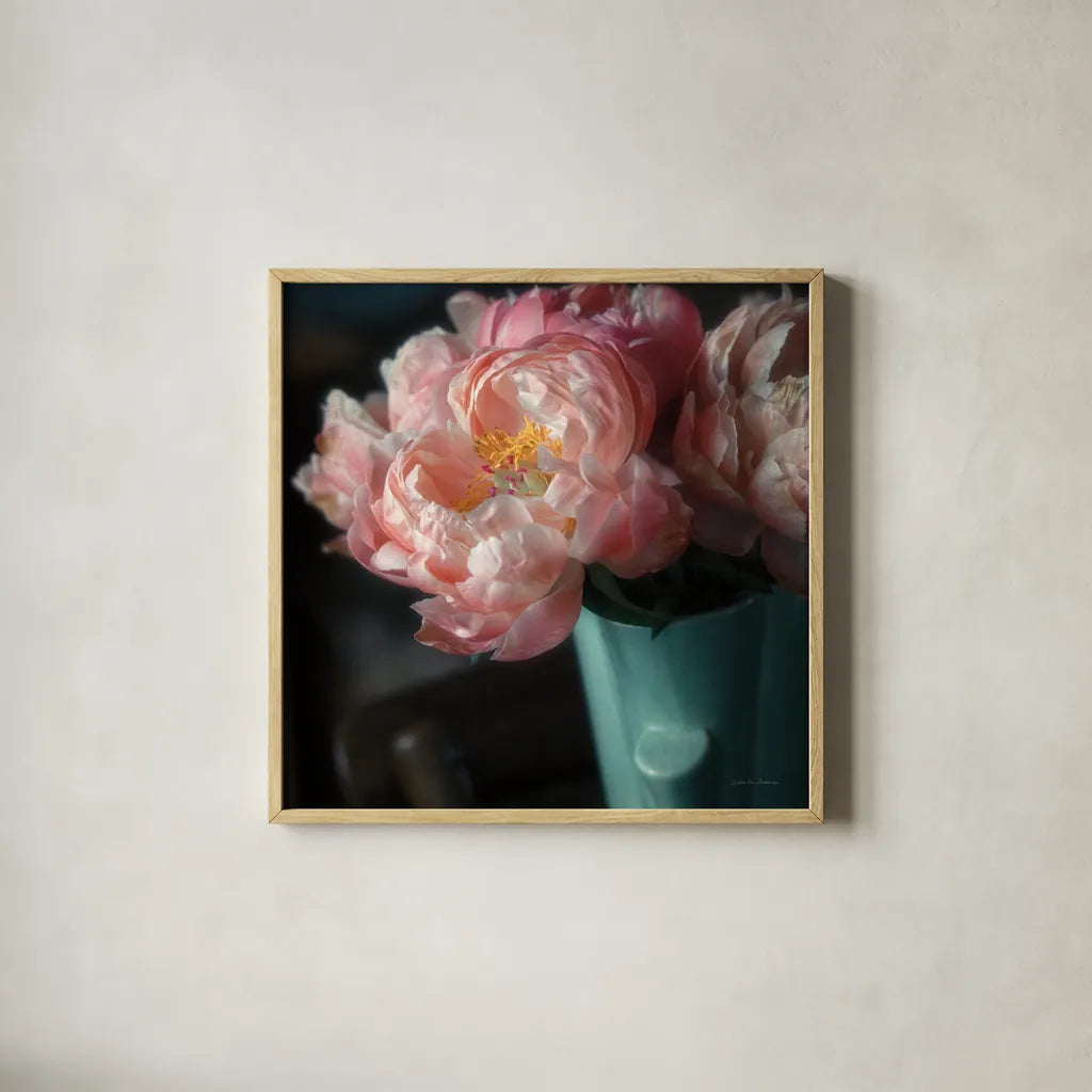 Coral Peonies I by Debra Van Swearingen. Shown in a natural wood glass frame for a timeless modern aesthetic. Available as an archival giclee rolled canvas, fine art paper, or poster print. SKU 86250a.