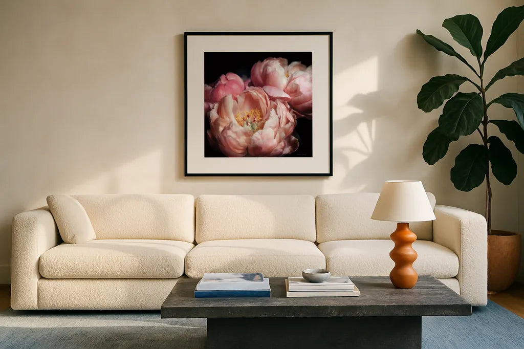 Coral Peonies II by Debra Van Swearingen. Displayed in a glass frame with matte in a clean modern living room. Available as an archival giclee rolled canvas, fine art paper, or poster print. SKU 86251a.