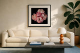 Coral Peonies III by Debra Van Swearingen. Displayed in a glass frame with matte in a clean modern living room. Available as an archival giclee rolled canvas, fine art paper, or poster print. SKU 86252a.