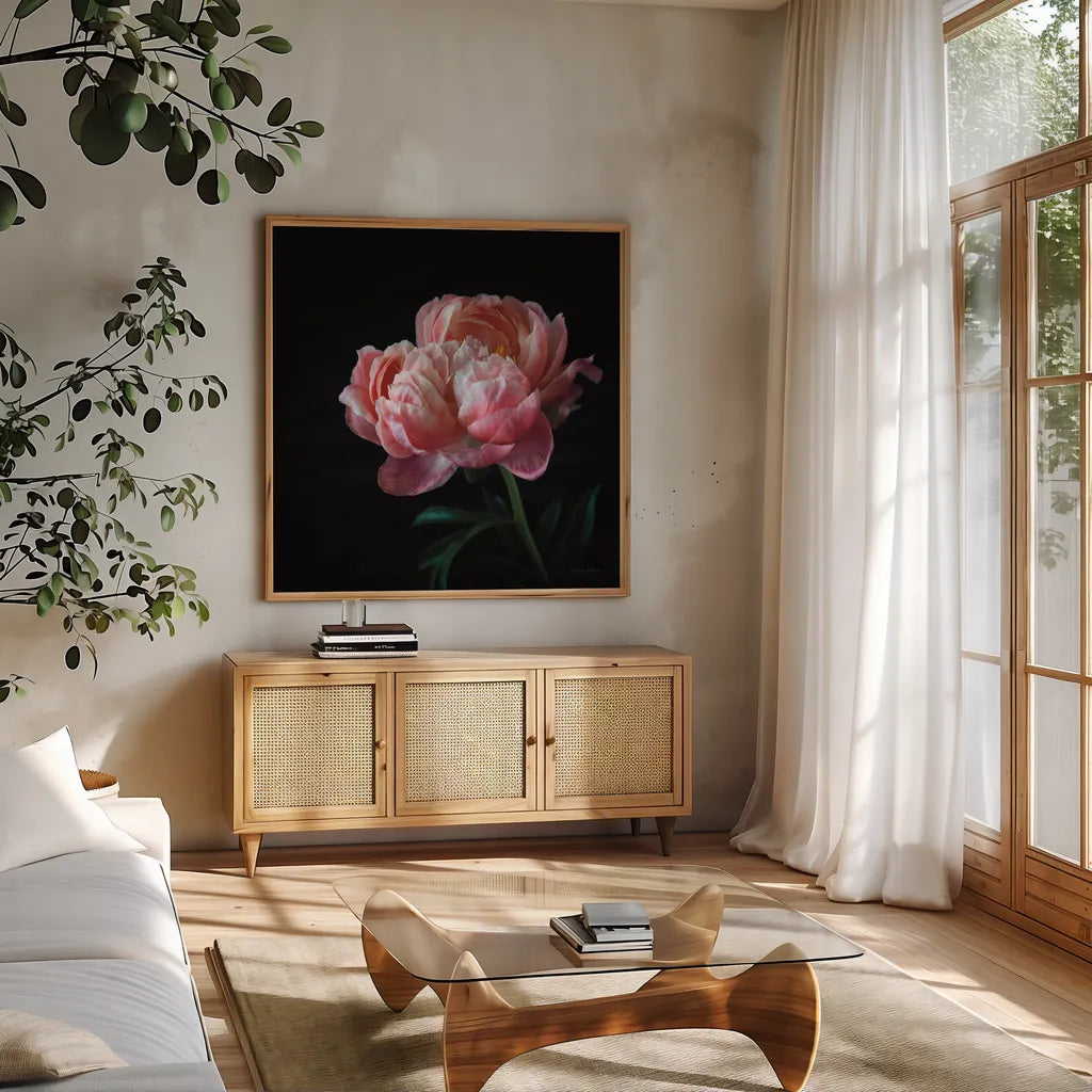 Coral Peonies V by Debra Van Swearingen. Shown in a natural wood frame in a cozy modern living room. Available as an archival giclee rolled canvas, fine art paper, or poster print. SKU 86254a.