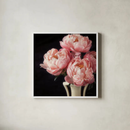 Coral Peonies VI by Debra Van Swearingen. Shown in a crisp white glass frame for a clean and minimalist style. Available as an archival giclee rolled canvas, fine art paper, or poster print. SKU 86255a.