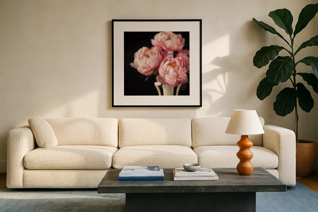 Coral Peonies VI by Debra Van Swearingen. Displayed in a glass frame with matte in a clean modern living room. Available as an archival giclee rolled canvas, fine art paper, or poster print. SKU 86255a.