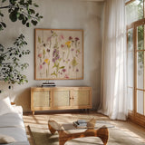 Cottage Flora I by Debra Van Swearingen. Shown in a natural wood frame in a cozy modern living room. Available as an archival giclee rolled canvas, fine art paper, or poster print. SKU 86783a.