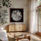 Dahlia II BW by Debra Van Swearingen. Shown in a natural wood frame in a cozy modern living room. Available as an archival giclee rolled canvas, fine art paper, or poster print. SKU 89723a.