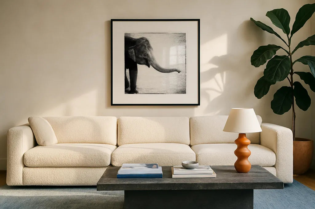 Elephant II by Debra Van Swearingen. Displayed in a glass frame with matte in a clean modern living room. Available as an archival giclee rolled canvas, fine art paper, or poster print. SKU 19400a.