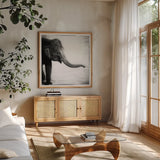 Elephant II by Debra Van Swearingen. Shown in a natural wood frame in a cozy modern living room. Available as an archival giclee rolled canvas, fine art paper, or poster print. SKU 20878a.