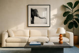 Elephant II No Border by Debra Van Swearingen. Displayed in a glass frame with matte in a clean modern living room. Available as an archival giclee rolled canvas, fine art paper, or poster print. SKU 41815a.