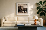 Elephant III Sepia by Debra Van Swearingen. Displayed in a glass frame with matte in a clean modern living room. Available as an archival giclee rolled canvas, fine art paper, or poster print. SKU 46877a.