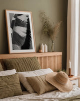 Feather Shadow I by Debra Van Swearingen. shown as a paper print in a natural frame. Available as a archival giclee rolled canvas, fine art paper, or poster print. SKU 55154h.
