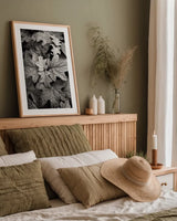 Hydrangea Leaves in Black and White by Debra Van Swearingen. shown as a paper print in a natural frame. Available as a archival giclee rolled canvas, fine art paper, or poster print. SKU 63371h.