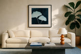 Leaves on Linen I by Debra Van Swearingen. Displayed in a glass frame with matte in a clean modern living room. Available as an archival giclee rolled canvas, fine art paper, or poster print. SKU 19426a.