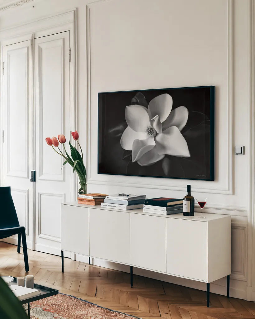 Magnolia by Debra Van Swearingen. shown as a framed stretched canvas in a living room above a console. Available as a archival giclee rolled canvas, fine art paper, or poster print. SKU 12233i.
