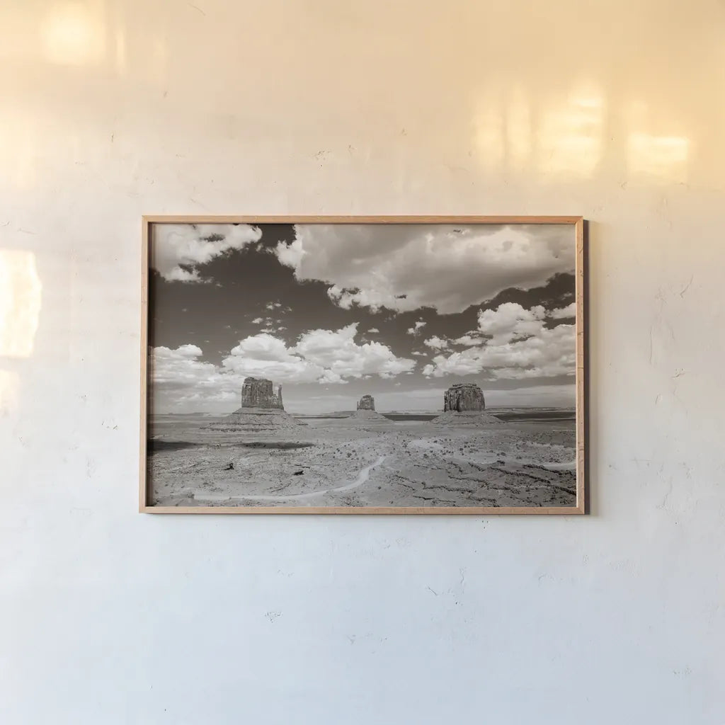 Monument Valley I Sepia by Debra Van Swearingen. shown as a paper print in a natural frame. Available as a archival giclee rolled canvas, fine art paper, or poster print. SKU 81269i.