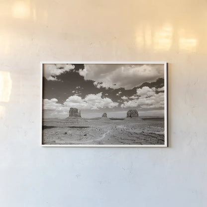 Monument Valley I Sepia by Debra Van Swearingen. shown as a paper print in a white frame. Available as a archival giclee rolled canvas, fine art paper, or poster print. SKU 81269i.