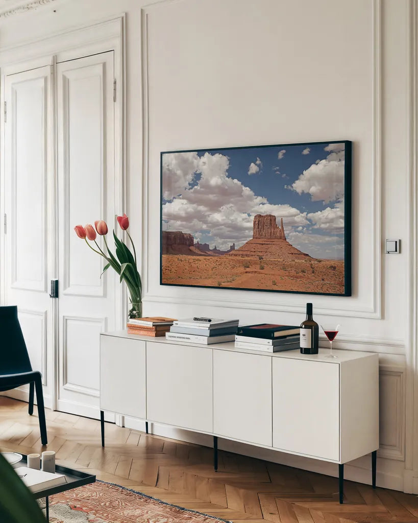Monument Valley II by Debra Van Swearingen. shown as a framed stretched canvas in a living room above a console. Available as a archival giclee rolled canvas, fine art paper, or poster print. SKU 81266i.