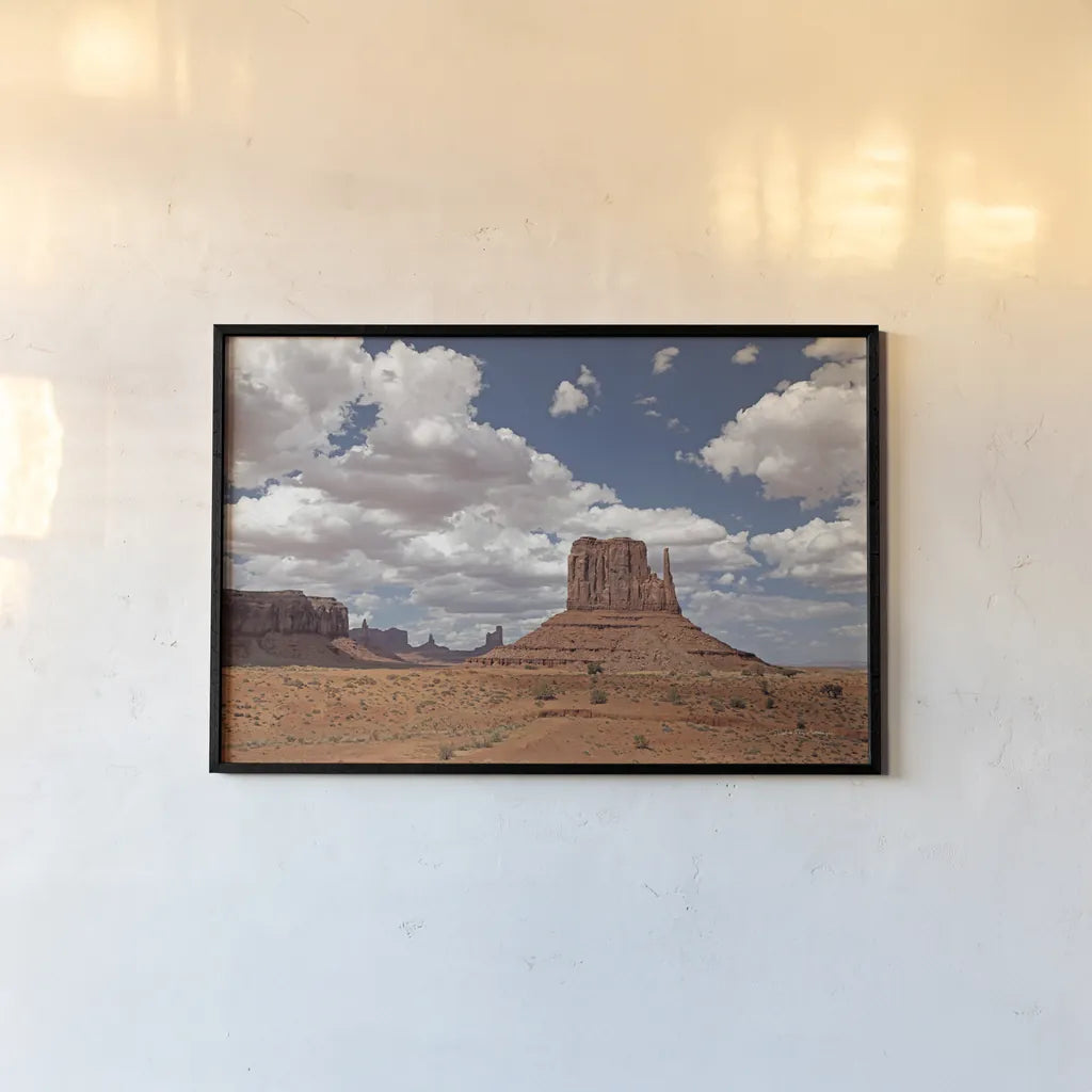 Monument Valley II by Debra Van Swearingen. shown as a paper print in a black flame. Available as a archival giclee rolled canvas, fine art paper, or poster print. SKU 81266i.