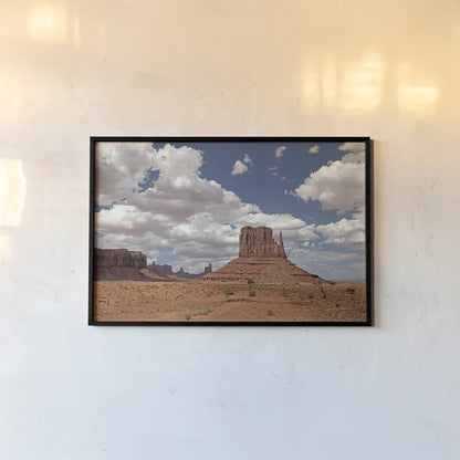 Monument Valley II by Debra Van Swearingen. shown as a paper print in a black flame. Available as a archival giclee rolled canvas, fine art paper, or poster print. SKU 81266i.