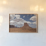 Monument Valley II by Debra Van Swearingen. shown as a paper print in a natural frame. Available as a archival giclee rolled canvas, fine art paper, or poster print. SKU 81266i.