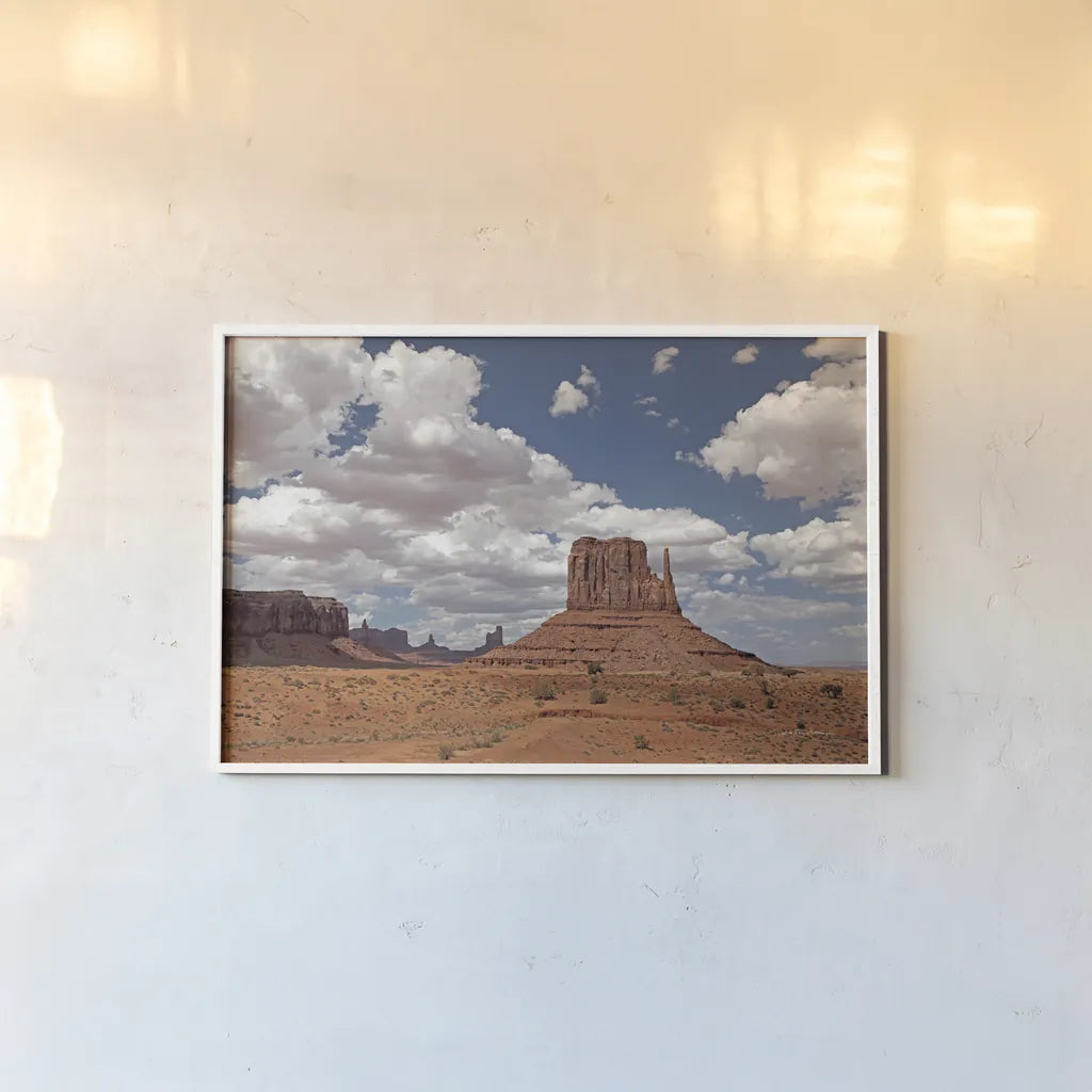 Monument Valley II by Debra Van Swearingen. shown as a paper print in a white frame. Available as a archival giclee rolled canvas, fine art paper, or poster print. SKU 81266i.