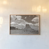 Monument Valley II Sepia by Debra Van Swearingen. shown as a paper print in a natural frame. Available as a archival giclee rolled canvas, fine art paper, or poster print. SKU 81270i.