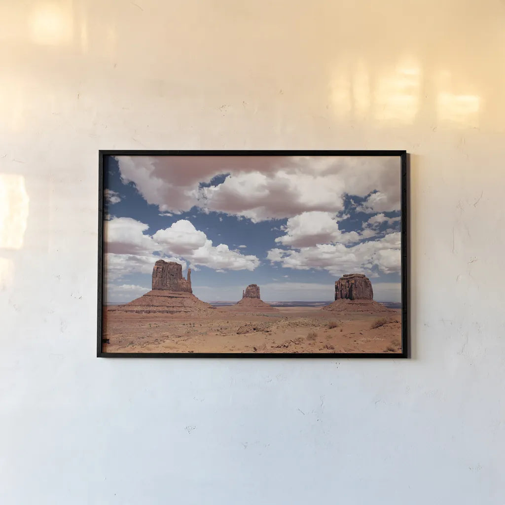 Monument Valley III by Debra Van Swearingen. shown as a paper print in a black flame. Available as a archival giclee rolled canvas, fine art paper, or poster print. SKU 81267i.
