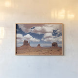 Monument Valley III by Debra Van Swearingen. shown as a paper print in a natural frame. Available as a archival giclee rolled canvas, fine art paper, or poster print. SKU 81267i.