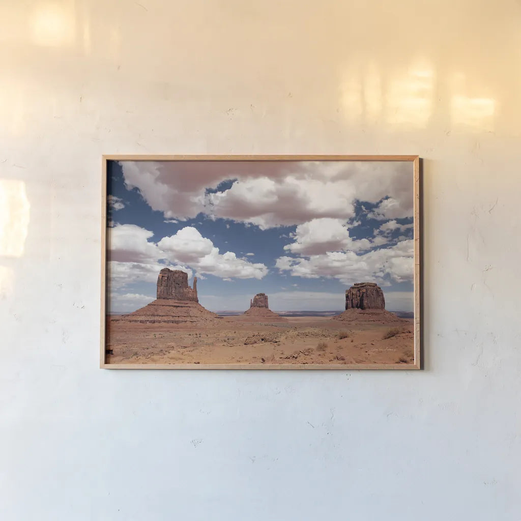 Monument Valley III by Debra Van Swearingen. shown as a paper print in a natural frame. Available as a archival giclee rolled canvas, fine art paper, or poster print. SKU 81267i.
