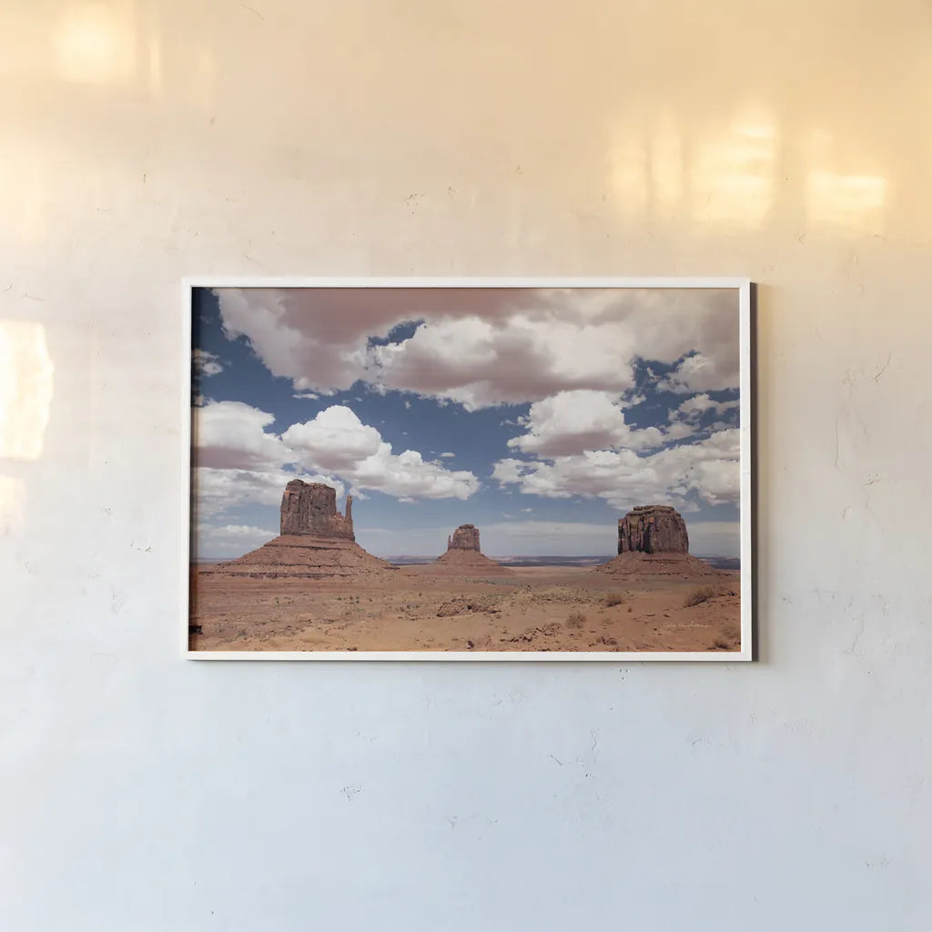 Monument Valley III by Debra Van Swearingen. shown as a paper print in a white frame. Available as a archival giclee rolled canvas, fine art paper, or poster print. SKU 81267i.