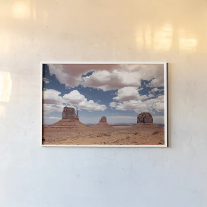 Monument Valley III by Debra Van Swearingen. shown as a paper print in a white frame. Available as a archival giclee rolled canvas, fine art paper, or poster print. SKU 81267i.