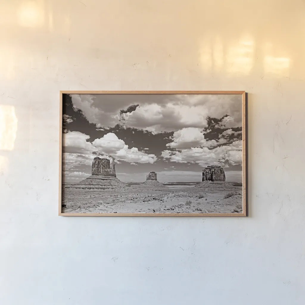 Monument Valley III Sepia by Debra Van Swearingen. shown as a paper print in a natural frame. Available as a archival giclee rolled canvas, fine art paper, or poster print. SKU 81271i.