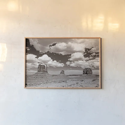 Monument Valley III Sepia by Debra Van Swearingen. shown as a paper print in a natural frame. Available as a archival giclee rolled canvas, fine art paper, or poster print. SKU 81271i.