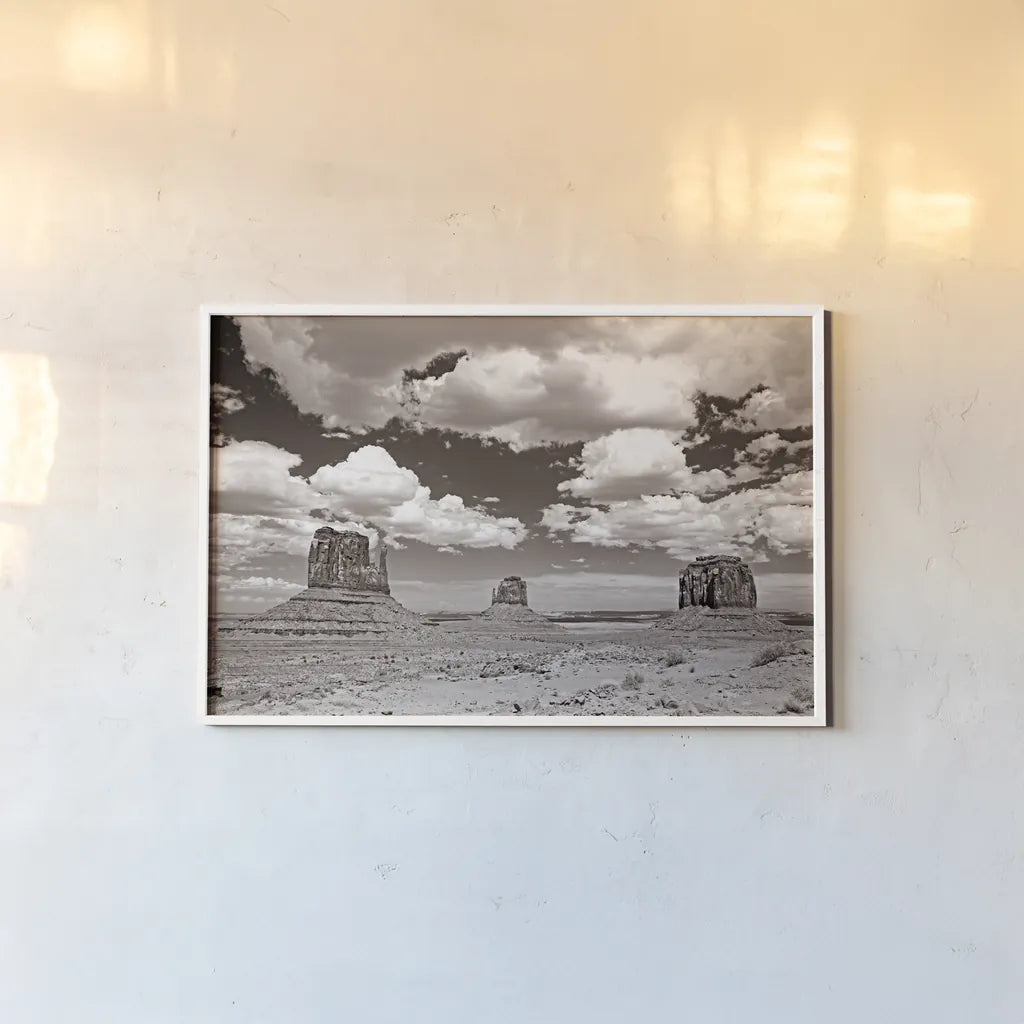 Monument Valley III Sepia by Debra Van Swearingen. shown as a paper print in a white frame. Available as a archival giclee rolled canvas, fine art paper, or poster print. SKU 81271i.