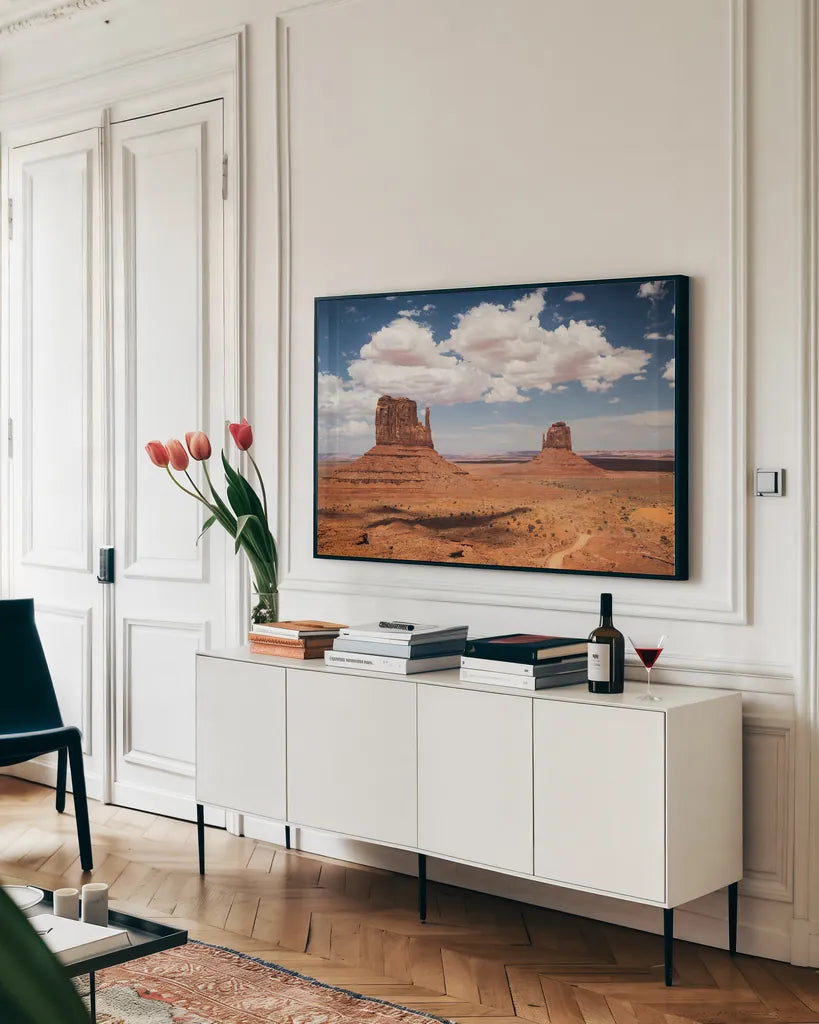 Monument Valley IV by Debra Van Swearingen. shown as a framed stretched canvas in a living room above a console. Available as a archival giclee rolled canvas, fine art paper, or poster print. SKU 81268i.