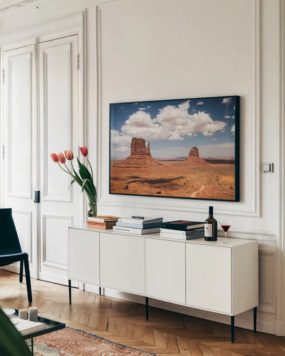 Monument Valley IV by Debra Van Swearingen. shown as a framed stretched canvas in a living room above a console. Available as a archival giclee rolled canvas, fine art paper, or poster print. SKU 81268i.