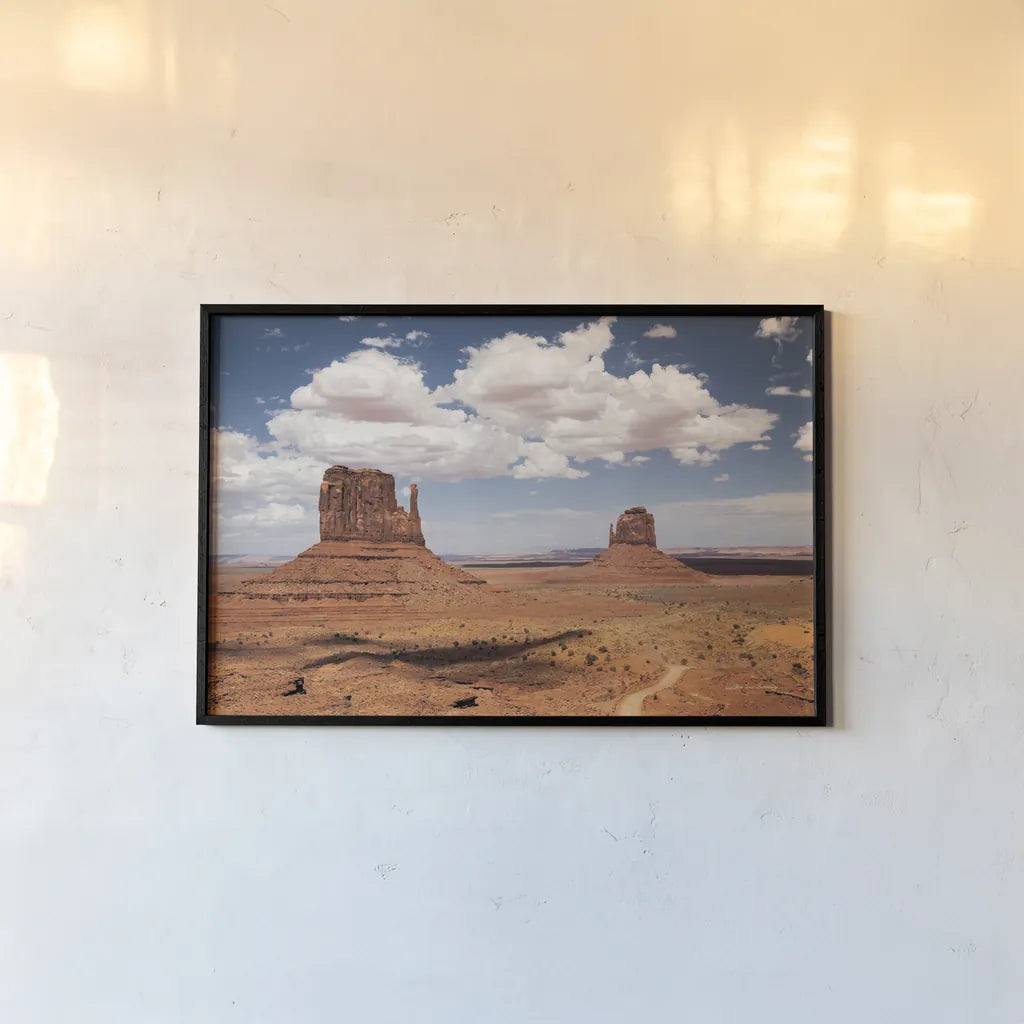 Monument Valley IV by Debra Van Swearingen. shown as a paper print in a black flame. Available as a archival giclee rolled canvas, fine art paper, or poster print. SKU 81268i.