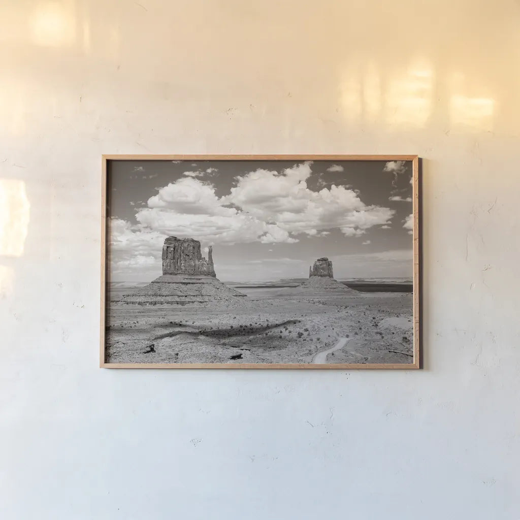 Monument Valley IV Sepia by Debra Van Swearingen. shown as a paper print in a natural frame. Available as a archival giclee rolled canvas, fine art paper, or poster print. SKU 81272i.