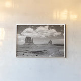 Monument Valley IV Sepia by Debra Van Swearingen. shown as a paper print in a white frame. Available as a archival giclee rolled canvas, fine art paper, or poster print. SKU 81272i.